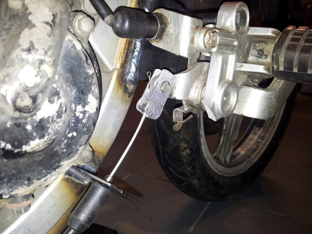 Foot Rests - Right foot rest with new brake cable installed
